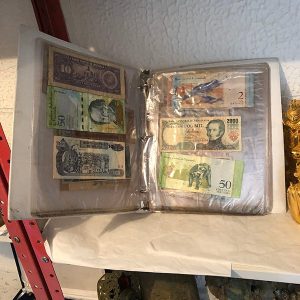 CARPETA CON BILLETES ANTIGUOS