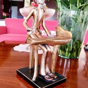 MUSICO DE COLECCION MOTIVO TECLADO, CERAMICA DECORATIVA